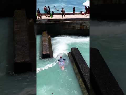 SURFER GETS SUCKED INTO STORM DRAIN #shorts